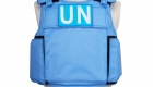 Front side of H Win's blue bulletproof vest featuring Level IV ceramic insert plates