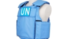 Side view of H Win's blue bulletproof vest featuring Level IV ceramic insert plates